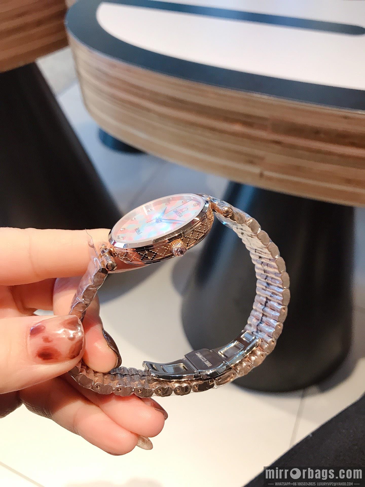 Replica Omega women 34mm M21